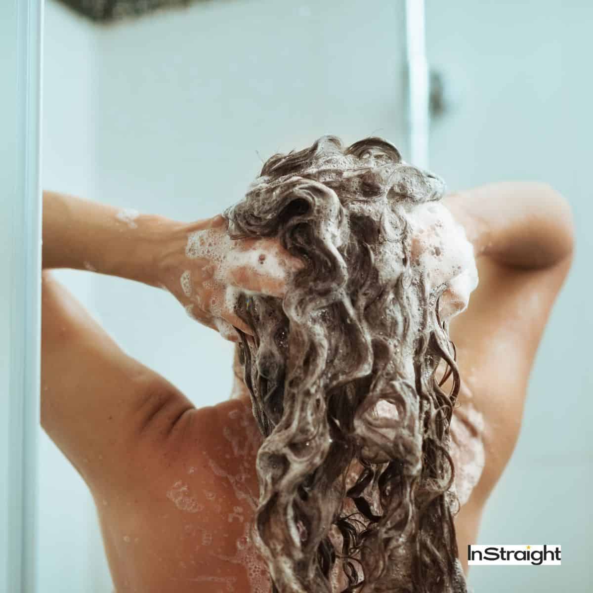 lady washing her hair at the shower room